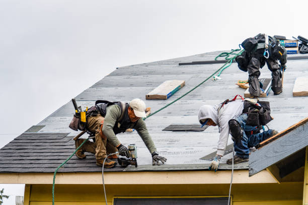 Professional Gutter Installation technician working in Chester, WV